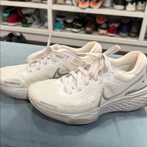 White and Gray Nike Zoomx Sneakers